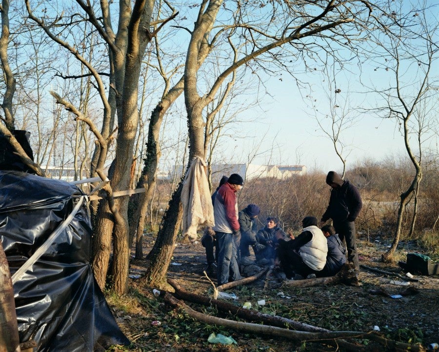 Bruno Serralongue, Groupe d’hommes 2, Calais, décembre 2008. From the 'Calais' series, 2006-20. © Air de Paris, Romainville