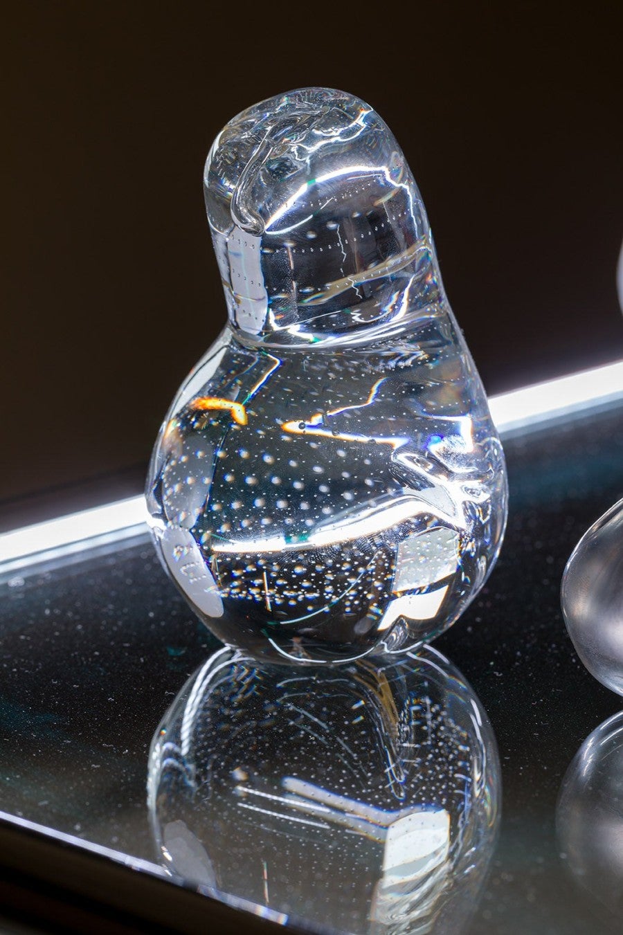 Chloé Quenum, La Grande Place, 2020. 111 fruits in full crystal. Dimensions variables. Exhibition view, Cristallerie Saint-Louis, Fondation Hermès, Saint-Louis-lès-Bitches, 2020. Photo: Tadzio