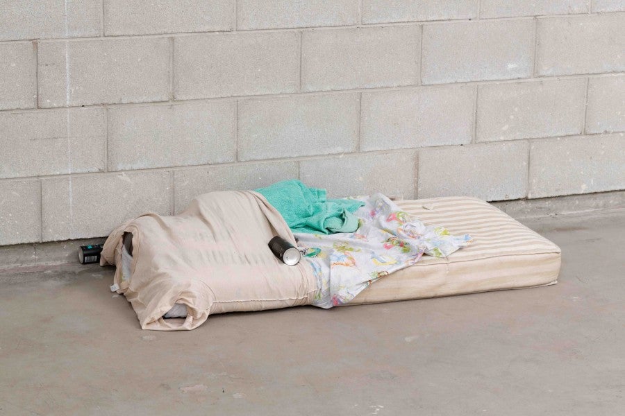 Jean-Charles de Quillacq, Portrait of my father sleeping, since 2003. Children's mattress, t-shirt, sheet, 144 x 60 x 30 cm. Ma sys­tème repro­duc­tive at Bétonsalon – Center for Art and Research, Paris, 2019. Photo: Aurélien Mole. Courtesy Marcelle Alix, Paris