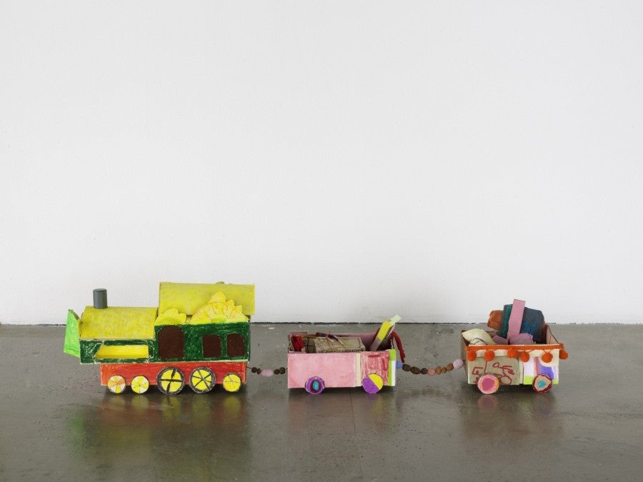 Sarah Tritz, Le train rouge, 2019, cardboard, ink, tempera, colored pencil, white and red beans, linen canvas, ceramic beads, 65 x 23 x 17 cm.