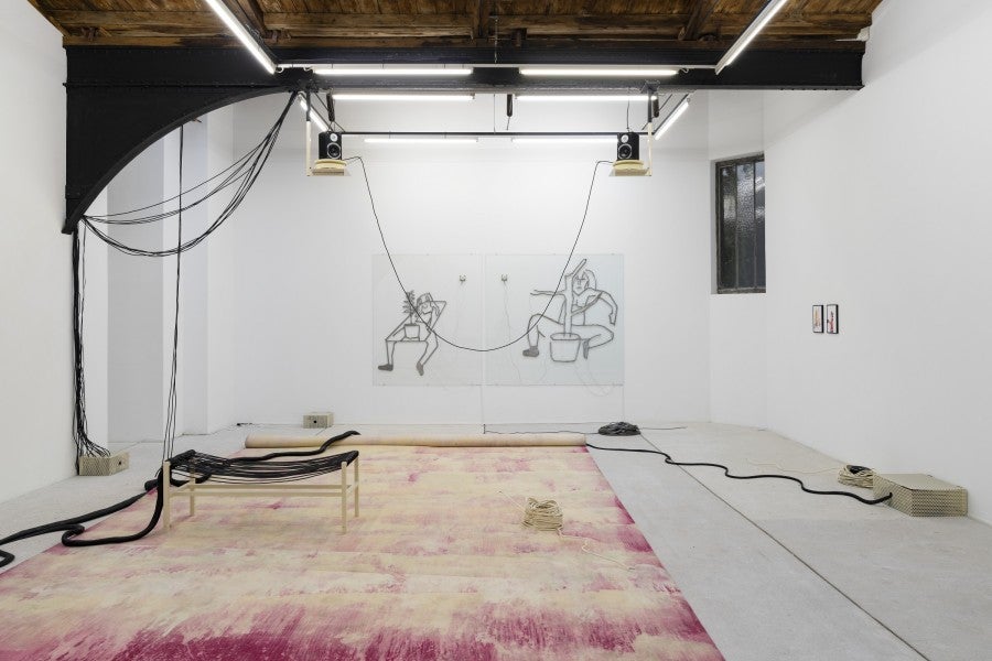 Anne Le Troter, <i>Le Corps Living Room</i>, 2023, sound installation, 30 minutes, glass, steel, transducers, audio cable, speakers, audio player, powder-coated steel box. Speakers: Martin Bakero, Eva Barto, Agathe Boulanger, Victoire Le Bars, Anne Le Troter, Simon Nicaise. Production: Loraine Baud/*Duuu radio. Courtesy of the artist and galerie frank elbaz